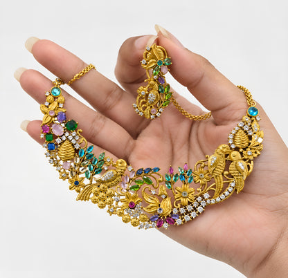 Matching gold bird motif earring with multicolour stones and chain