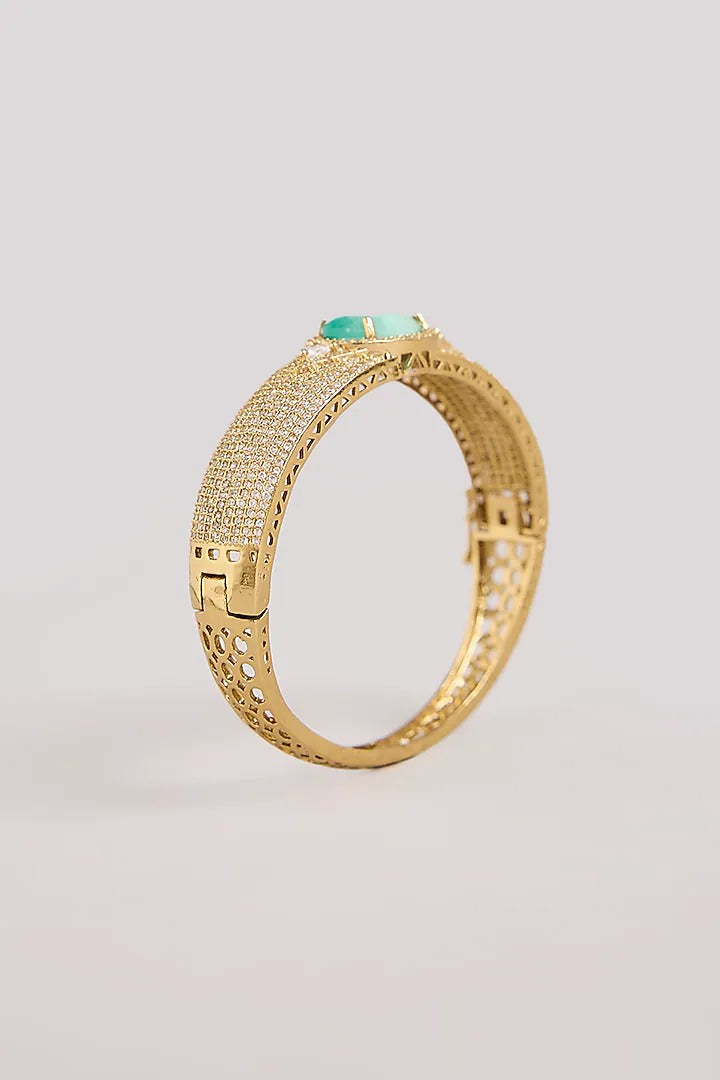 Mint green stone AD studded gold tone designer kada with sparkling white stones