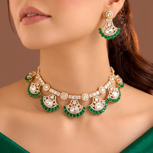 Gold kundan polki choker necklace set with emerald green fan drops and matching earrings by Auraa Trends