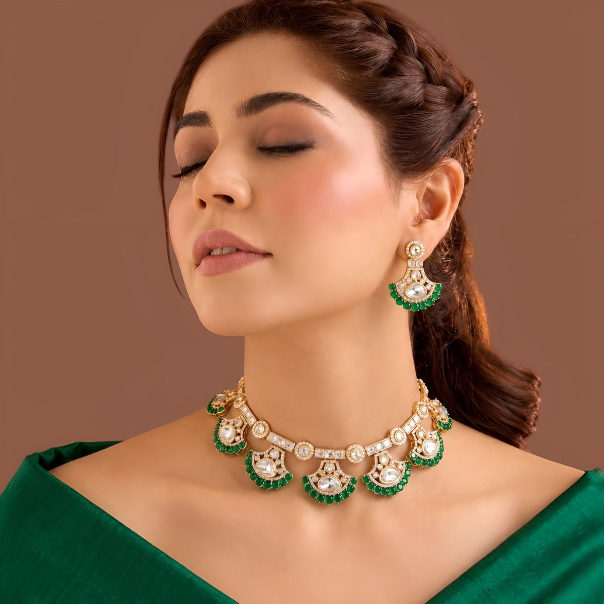 Gold kundan polki choker necklace set with emerald green fan drops and matching earrings by Auraa Trends