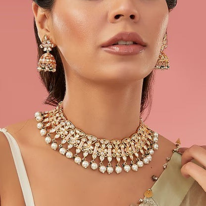 Kundan floral choker necklace set with pearl drops and matching jhumka earrings