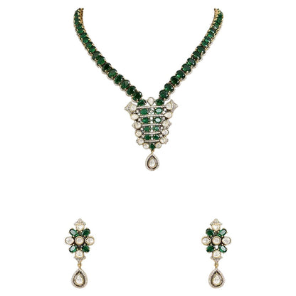 "Emerald green Kundan-style necklace and earring set with antique gold finish and white stone accents"