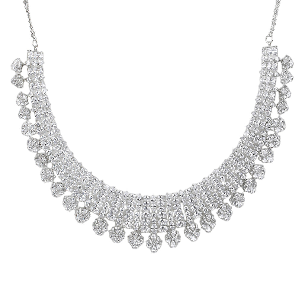 Silver American diamond necklace set with heart-shaped drop design and matching long earrings on white background