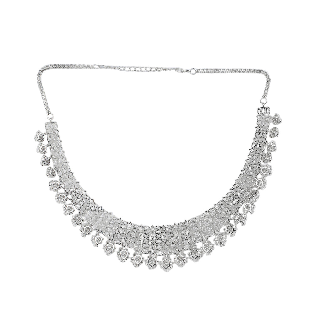 Silver American diamond necklace set with heart-shaped drop design and matching long earrings on white background