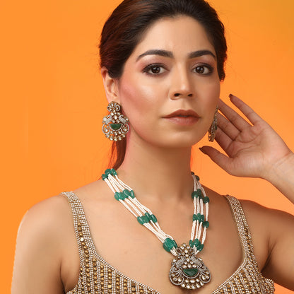 Green beaded Kundan long necklace set with pearl strands and matching traditional earrings for bridal and festive wear