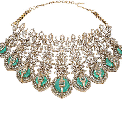 Gold plated choker necklace set with green stones and matching long earrings for bridal and party wear