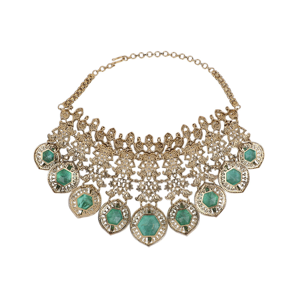 Gold plated choker necklace set with green stones and matching long earrings for bridal and party wear