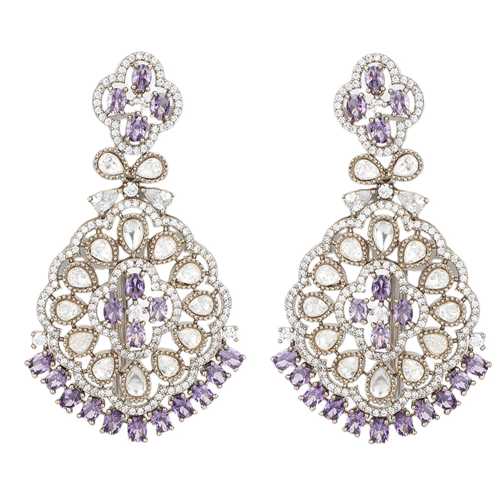 Silver plated necklace set with purple stones and matching earrings featuring intricate floral design for party and bridal wear
