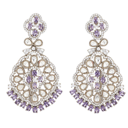 Silver plated necklace set with purple stones and matching earrings featuring intricate floral design for party and bridal wear