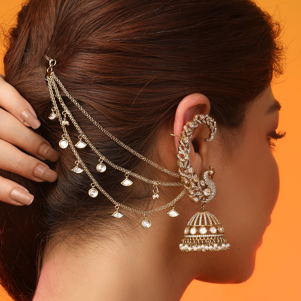 Gold-plated crystal multi-layer kaan chain for women with dangling charms, bridal ear chain accessory for weddings and festive wear.