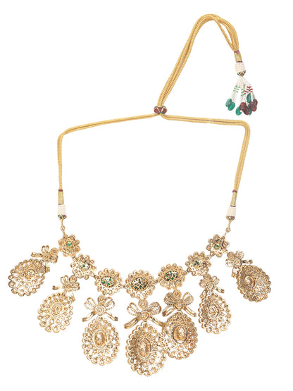 Gold-toned necklace with a braided cord and adjustable tassel tie, featuring intricate white stone detailing with oval green gemstones and multiple dangling teardrop motifs, paired with matching drop earrings, displayed on a plain light background.