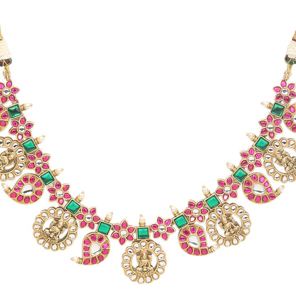 Gold plated temple Lakshmi necklace set with pink and green stones and matching earrings with pearl drops on white background