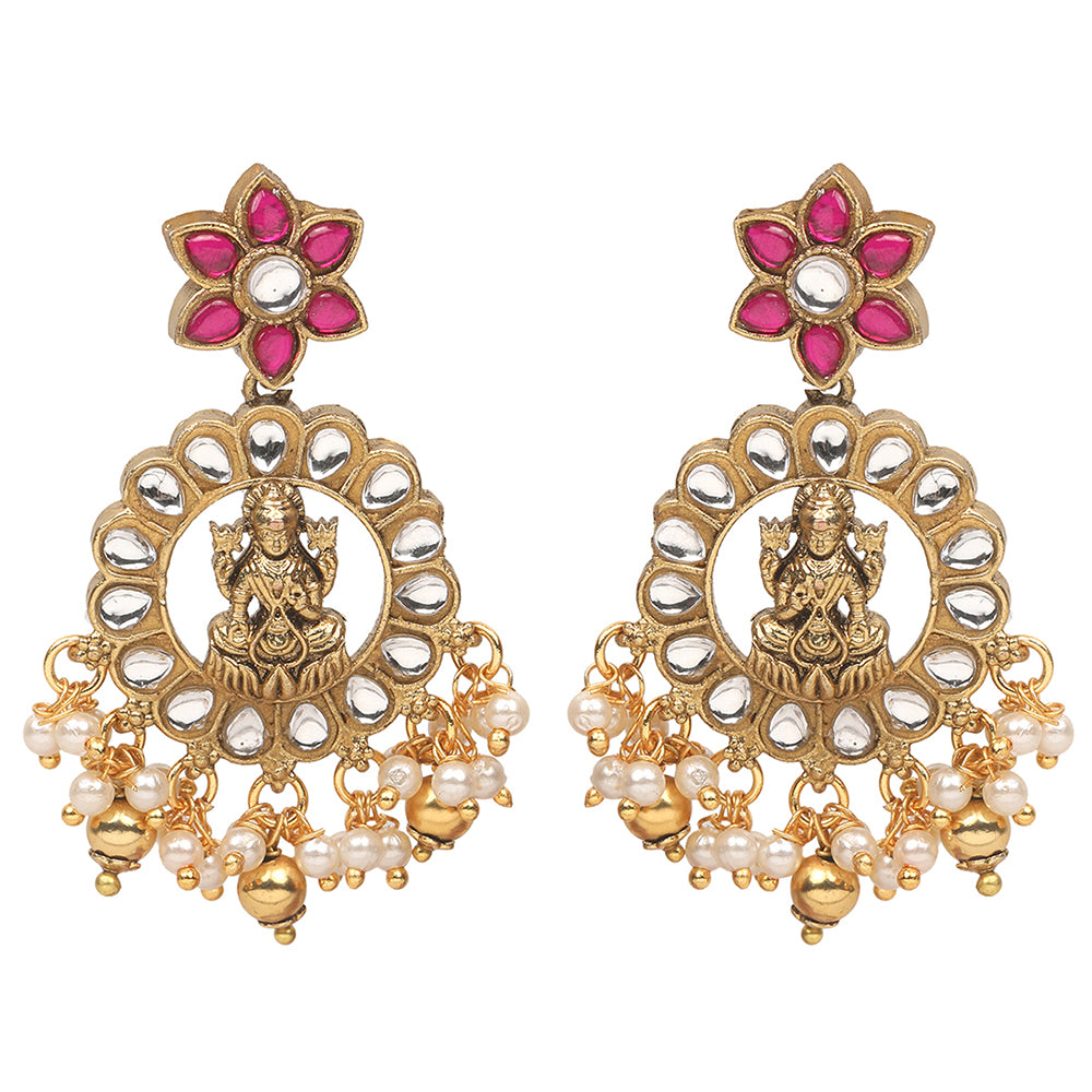 Gold plated temple Lakshmi necklace set with pink and green stones and matching earrings with pearl drops on white background