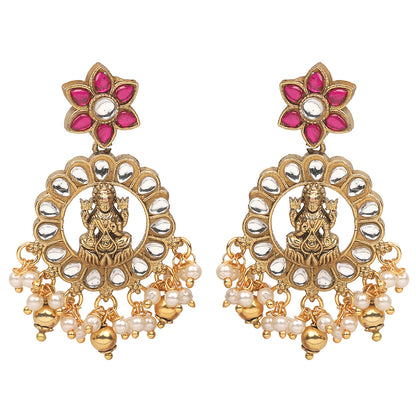 Gold plated temple Lakshmi necklace set with pink and green stones and matching earrings with pearl drops on white background