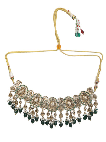 Elegant gold-tone choker necklace set with large mirror-polished stones, green bead accents, and pearl detailing, paired with matching dangling earrings