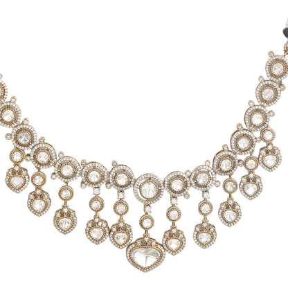 Gold plated Kundan necklace set with white stones and matching chandelier earrings for bridal and festive wear