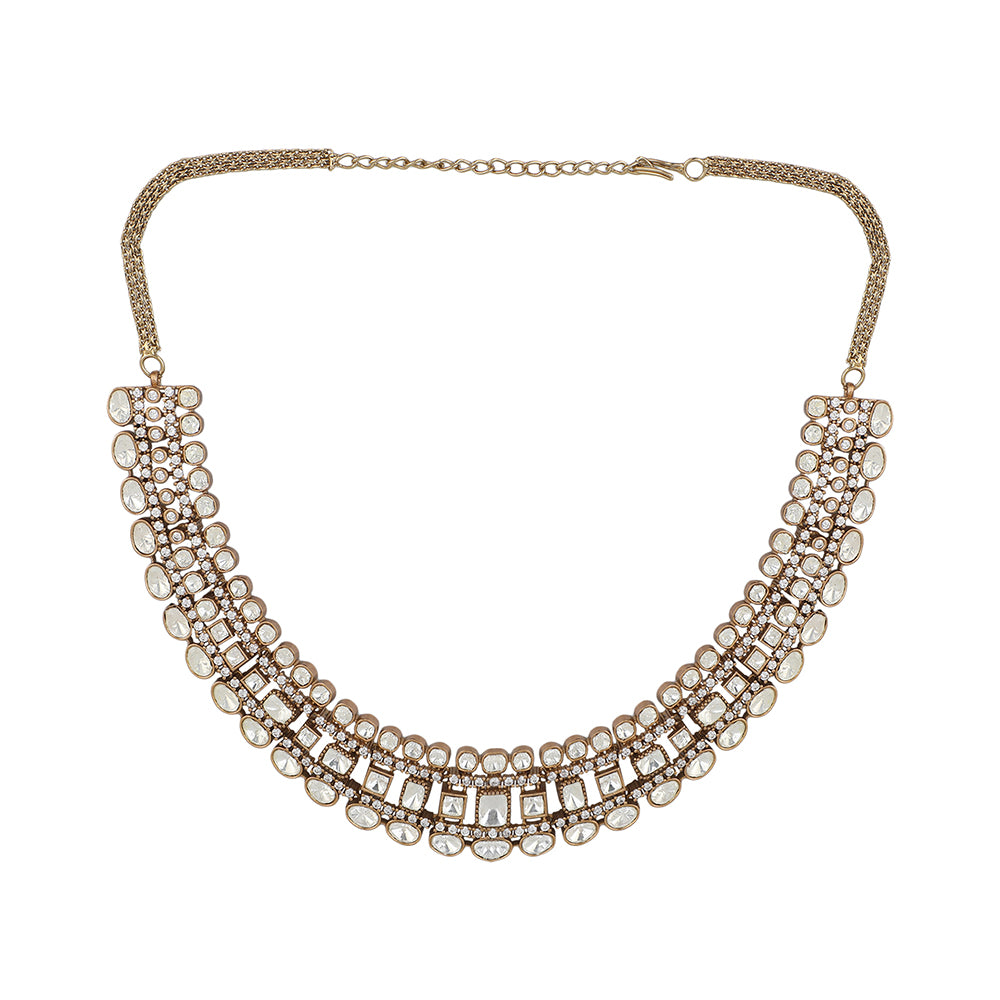 Gold polki Kundan choker necklace set with uncut stones and matching earrings for bridal and traditional Indian wear