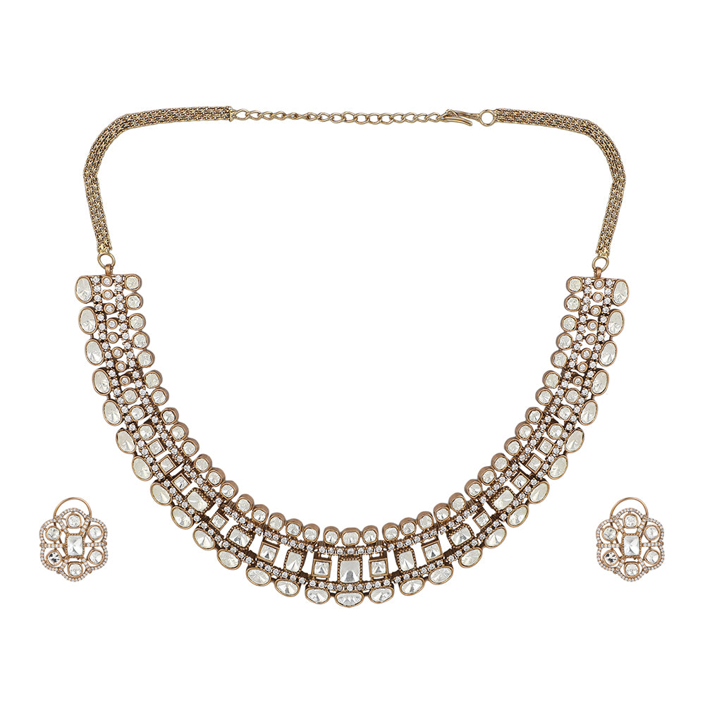 Gold polki Kundan choker necklace set with uncut stones and matching earrings for bridal and traditional Indian wear