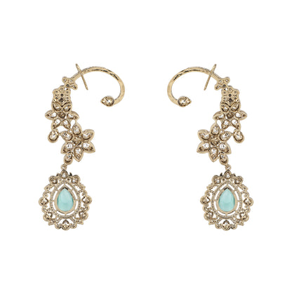 Gold floral kundan ear cuff earrings with green teardrop gemstone and intricate design