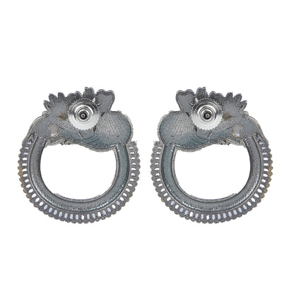 Dual tone gold and silver floral hoop earrings with intricate traditional design on neutral background