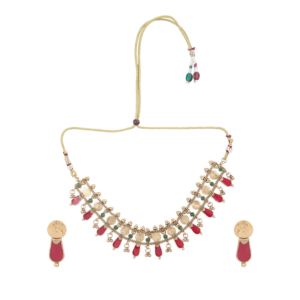 Aviana gold plated temple necklace set with red drops, green stones, and matching earrings on white background