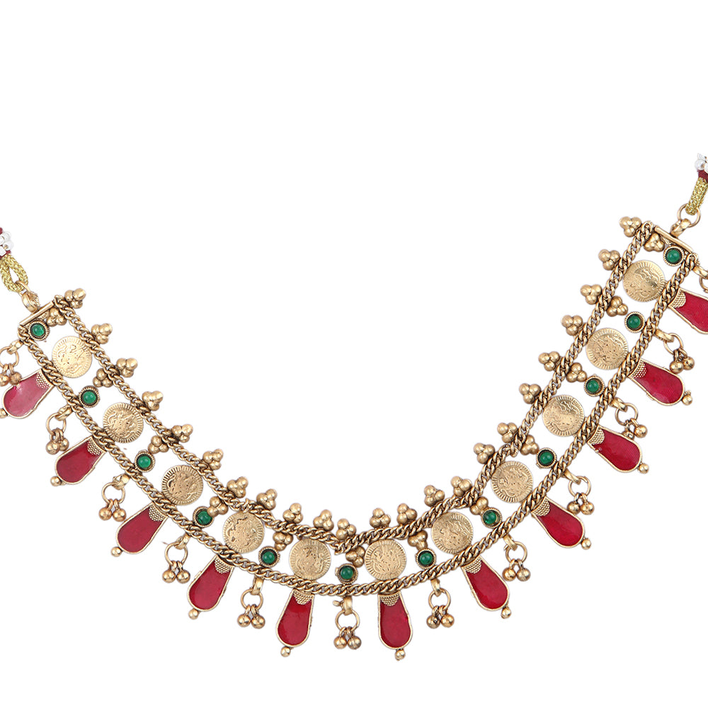 Aviana gold plated temple necklace set with red drops, green stones, and matching earrings on white background