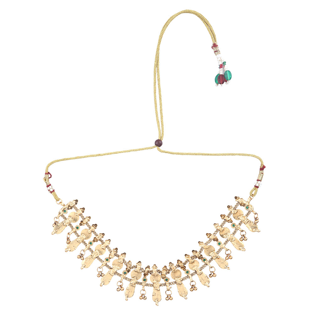 Aviana gold plated temple necklace set with red drops, green stones, and matching earrings on white background