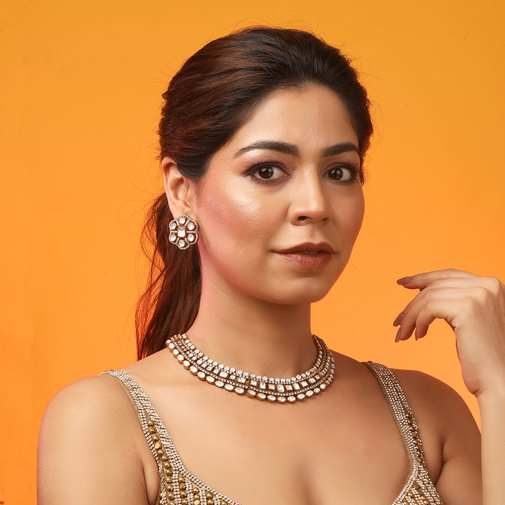 Gold polki Kundan choker necklace set with uncut stones and matching earrings for bridal and traditional Indian wear