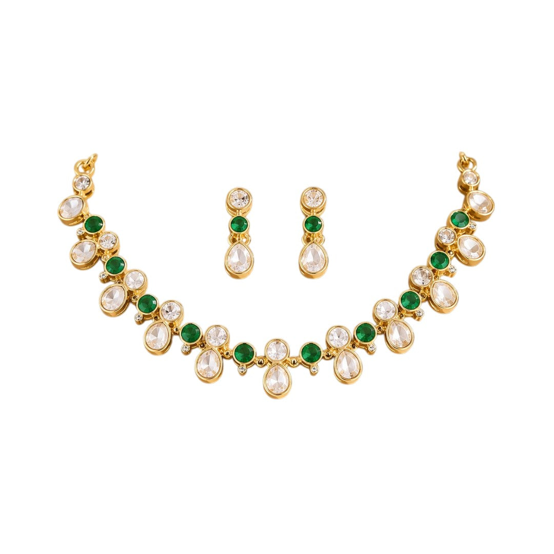 Gold-plated necklace set with green round stones, white teardrop crystal stones, and matching stud earrings for women, ideal for party, festive, and wedding wear.