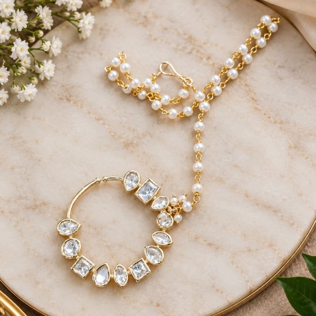 Kundan polki nath with pearl chain and hair hook for bridal nose ring look