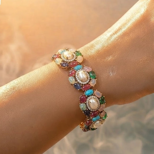 "Antique gold multicolor gemstone flower bracelet with pearl centers and toggle clasp"