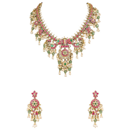 Pink and green Kundan-style necklace set with statement pendant and matching earrings