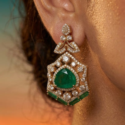 Luxury emerald green bridal choker necklace set with American diamonds and matching earrings on golden textured background.