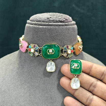 Gold-plated kundan choker necklace set with green centerpiece, pink and peach stones, navratna floral motifs and matching drop earrings