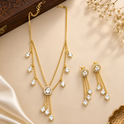 Gold plated double-chain necklace set with pear-shaped zircon drops and matching tassel earrings