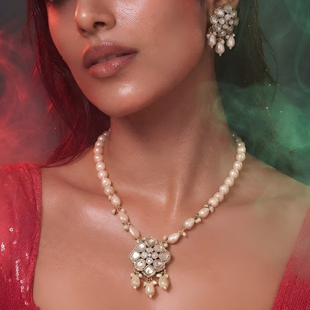 Elegant pearl necklace set with Kundan-style pendant and matching pearl drop earrings

