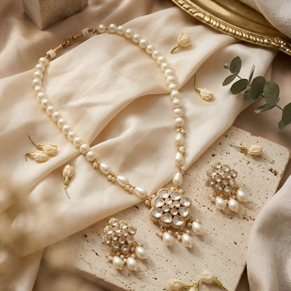 Elegant pearl necklace set with Kundan-style pendant and matching pearl drop earrings

