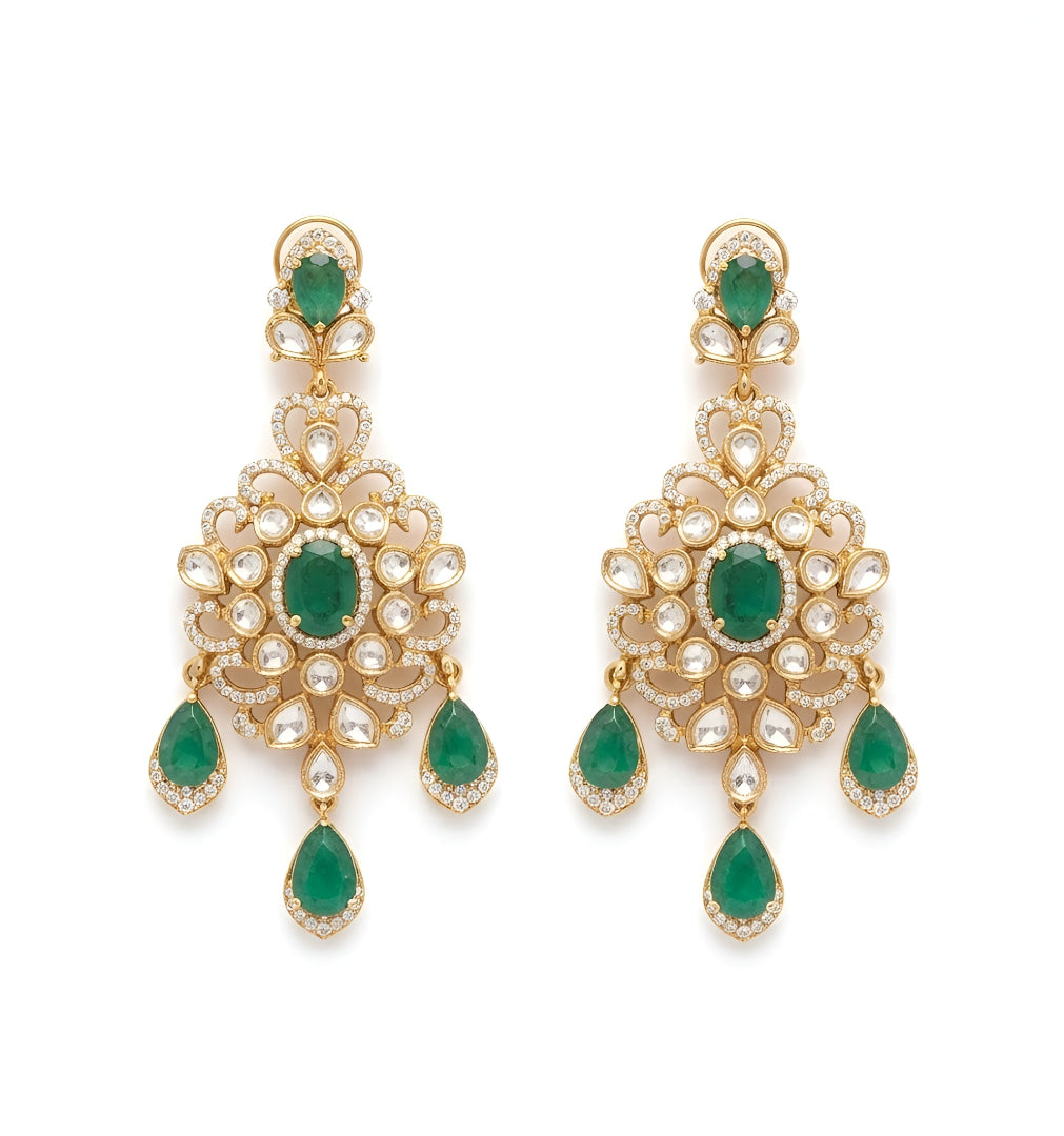 Gold kundan polki bridal necklace set with emerald green pear and oval stones, teardrop drops and matching chandelier earrings