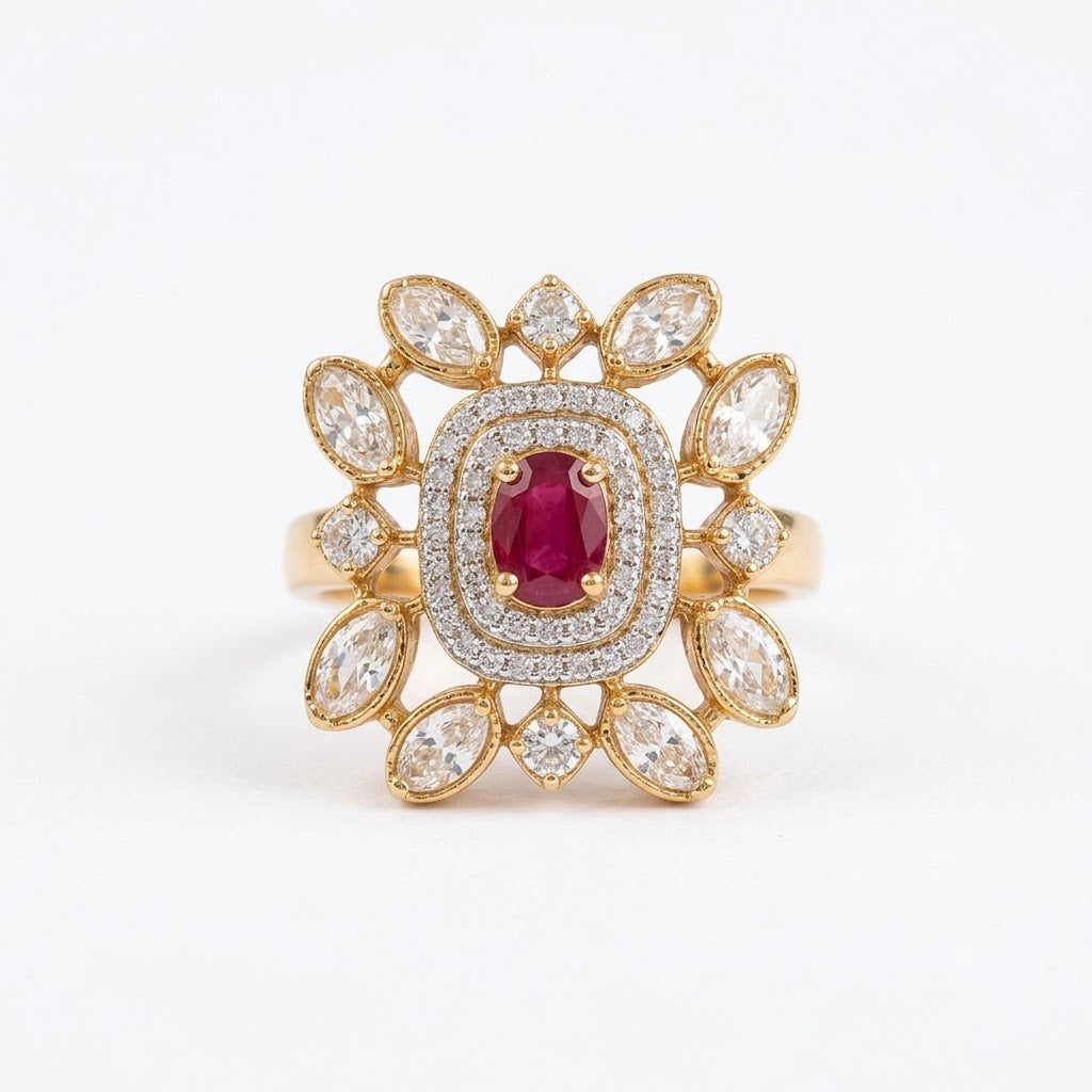 Gold-finish floral cocktail ring with a ruby-pink oval centre stone, double American diamond halo, and clear marquise-cut petal stones