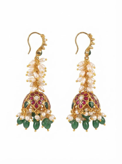 Antique gold jhumka earrings with rice pearl cluster, ruby pink floral dome and green bead drops