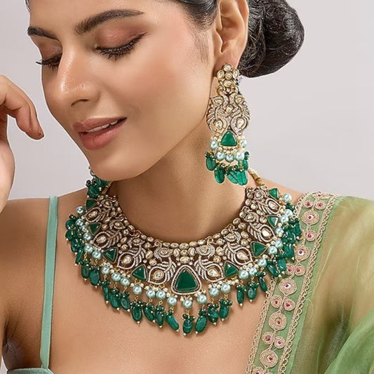 Bridal kundan choker necklace set with emerald green stone drops and matching earrings