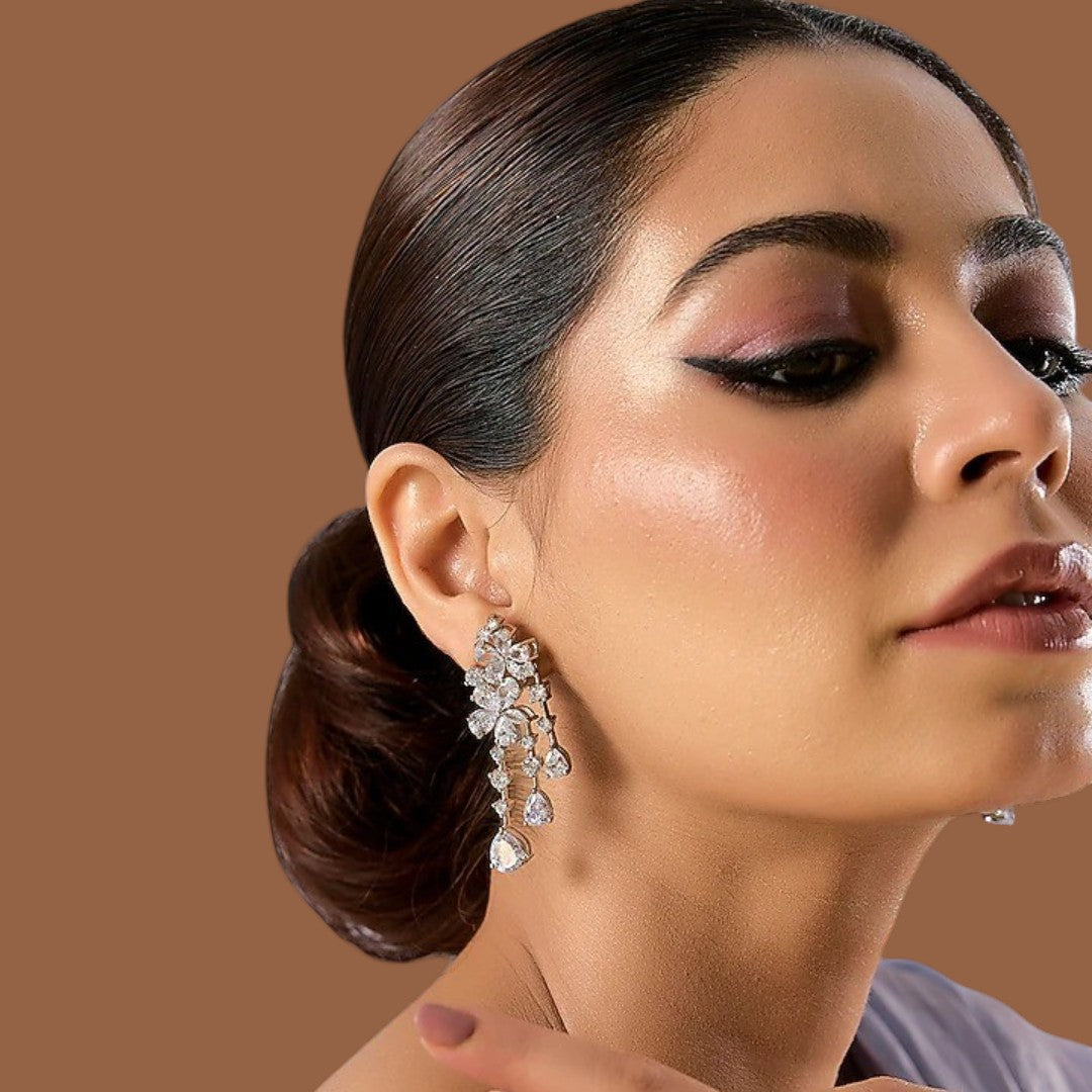 Sparkling crystal floral cascade dangle earrings with multiple teardrop-shaped drops


