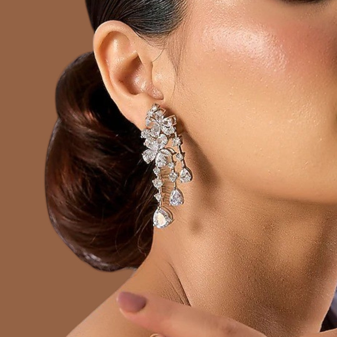 Sparkling crystal floral cascade dangle earrings with multiple teardrop-shaped drops


