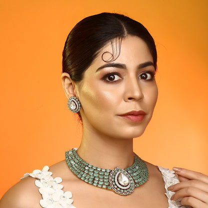 Gold plated mint green choker necklace set with teardrop pendant and matching earrings for bridal and party wear