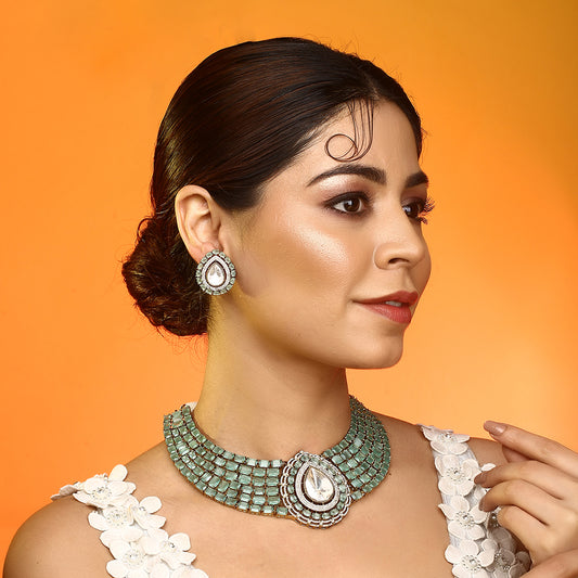 Gold plated mint green choker necklace set with teardrop pendant and matching earrings for bridal and party wear
