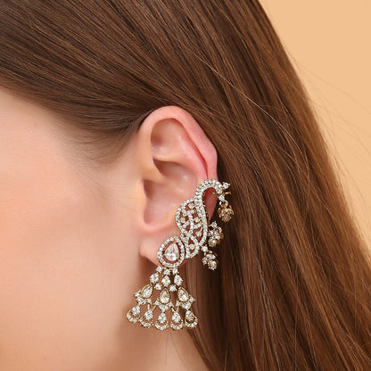 Gold-plated American diamond peacock ear cuff earrings for women with chandelier drop design, perfect for bridal, wedding, festive, and party wear.