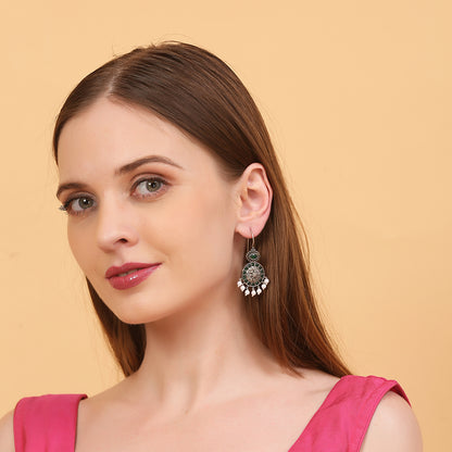 Oxidized silver earrings with green stones circular design and pearl drop danglers