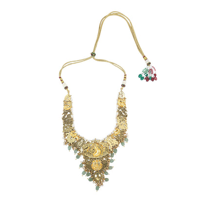 Gold plated temple Lakshmi bridal necklace set with pink green stones and jhumka earrings with pearl and bead drops on white background