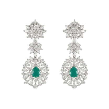 "Silver rhodium-plated bridal necklace set with white American diamonds and green emerald drop stones, paired with matching floral drop earrings"