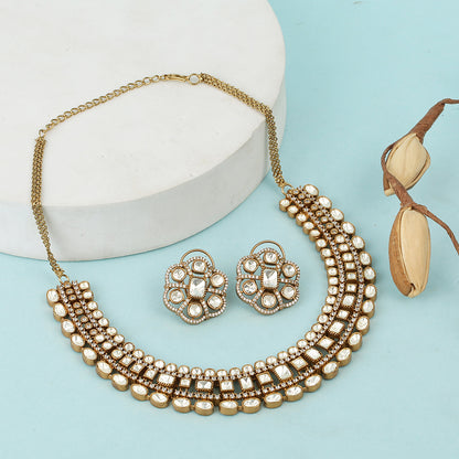 Gold polki Kundan choker necklace set with uncut stones and matching earrings for bridal and traditional Indian wear